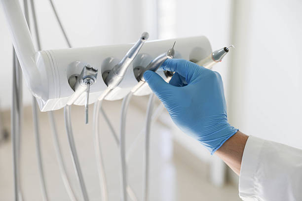 Professional Tooth Extraction technician working in Utica, IN